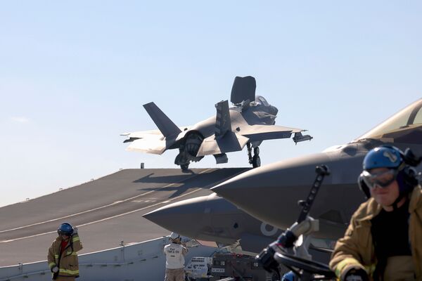 An F-35B launches from the deck of HMS Queen Elizabeth on the ship's first operational use of its embarked air power.  (Crown Copyright)