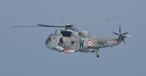 An Indian Navy Sea King Mk 42B helicopter prepares to launch a Naval Anti-Ship Missile-Short Range during trials off the coast in eastern India on 25 February 2025.
