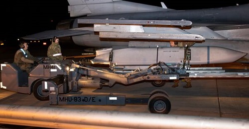 US airmen load a Joint Air-to-Surface Standoff Missile (JASSM) aboard an F-16 in 2024. Long-Range Anti-Ship Missile (LRASM) shares the same mould line as JASSM.