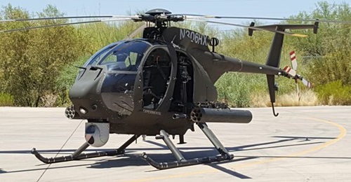 A Saudi AH-6SA helicopter fitted with 70 mm rocket pods of the type that will soon carry the APKWS II laser-guided rocket systems.
