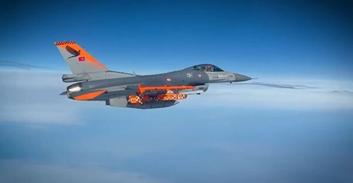 A still from the video released by Mehmet Fatih Kacir shows the F-16 carrying the SOM-J cruise missile that was tested.