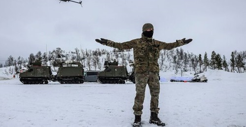 A UK Commando Force Ghost UAV surveilling the ground ahead of Royal Marines Armoured Support Group Viking vehicles as part of winter training in Norway in February 2025.
