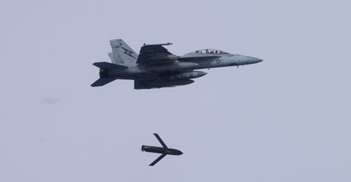 A Royal Australian Air Force Boeing F/A-18F Super Hornet of No 1 Squadron releases an AGM-158C Long-Range Anti-Ship Missile in February 2025.