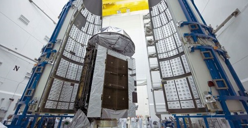 Workers prepare MUOS 4 for its launch in August 2015.