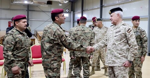 Major General Yusuf al-Hunaiti (right) meets members of the new Thunderbolt and Paratroopers Battalion.