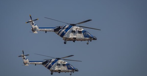 HAL has expressed optimism that India's fleet of Dhruv ALHs, which were grounded in January, will return to flying operations in mid-2025. The image shows ICG ALH Mk III helicopters flying in 2023.
