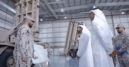 Sheikh Hamdan bin Mohammed bin Rashid al-Maktoum is shown an M-SAM launcher during a visit to Al-Dhafra Air Base.