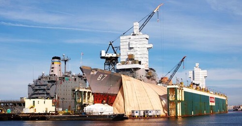 Tandem docking of ships, shown here in Norfolk, Virginia, in 2012, was heralded previously. Recently, such a potential scenario was used to penalise a contract proposal.