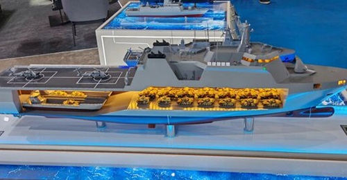 STM next-generation multirole support ship model displayed at LIMA 2025.
