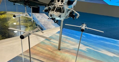 A model of the Marine Attack Helicopter on display at MADEX 2025.
