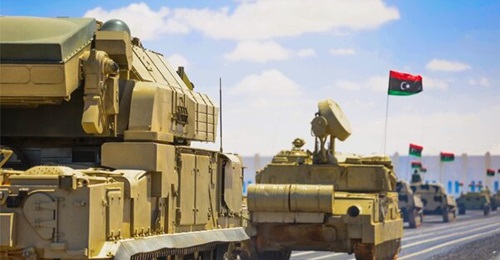 A Tor short-range air-defence system follows a ZSU-23-4. It does not have the auxiliary power unit that protrudes from the rear of the Tor-M2 and Tor-M2E versions.