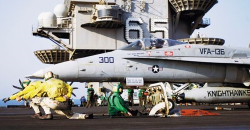 The US Navy awarded a contract to dismantle, recycle, and dispose of carrier 
        
        , shown here on deployment in 2007.
