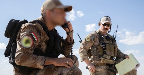 A CTS ITAC practices calling in an airstrike near Al-Asad Air Base during Exercise 'Phoenix Fires' in October.