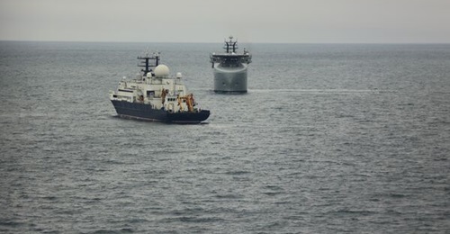 RFA 
        
        (background), the UK's first underwater surveillance ship, monitors Russian spy ship 
        
         as it passes through UK waters in November 2024.