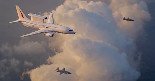 An artist's rendering of a Royal Australian Air Force E-7A Wedgetail teaming with two MQ-28 Ghost Bat 'loyal wingman' collaborative combat aircraft.