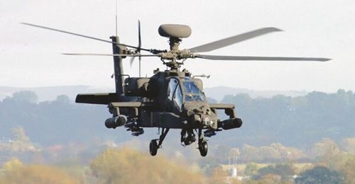 The UK is investing over GBP100 million in Autonomous Collaborative Platforms that will operate together with Apache attack helicopters (pictured).