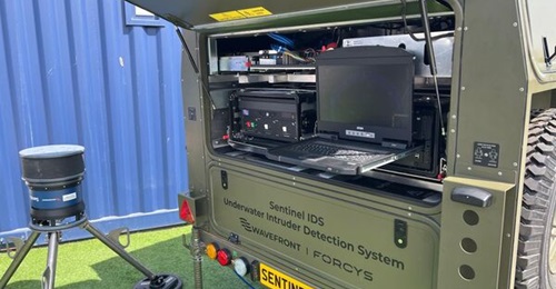 Wavefront's expeditionary trailer version of its Sentinel IDS, with a sonar head on a tripod to the left, seen at a demonstration in Portland Port, Dorset, UK, in June 2025.