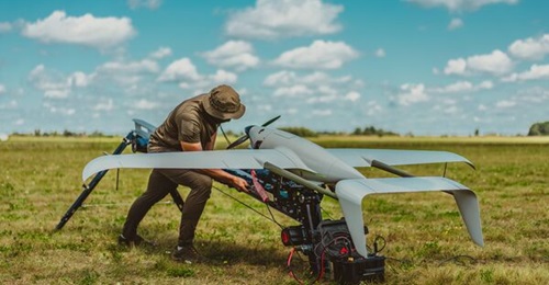 A Ukrainian serviceman prepares to launch the Raybird air vehicle, which after amassing more than 350,000 combat hours in Ukraine is now being pitched for UK military requirements.