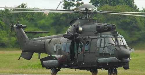 A Republic of Singapore Air Force H225M helicopter on the 
        
         at Sembawang Air Base.