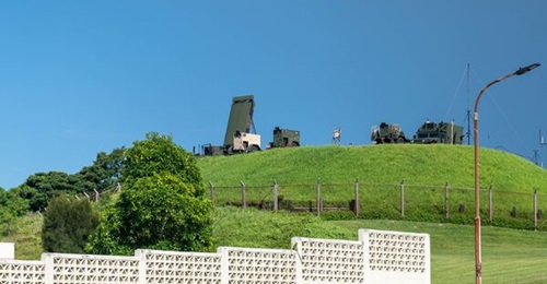 US marines set up an AN/TPS-80 Ground/Air Task-Oriented Radar system at Kadena Air Base, Japan, 26 June 2025.
