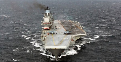 The Russian aircraft carrier, 
        
         is seen in a photograph released by the Russian Ministry of Defence on 25 February 2016.