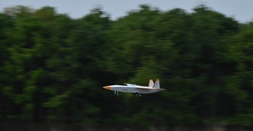 A subscale 'loyal wingman' demonstrator developed by Subaru conducts a test flight in 2025.