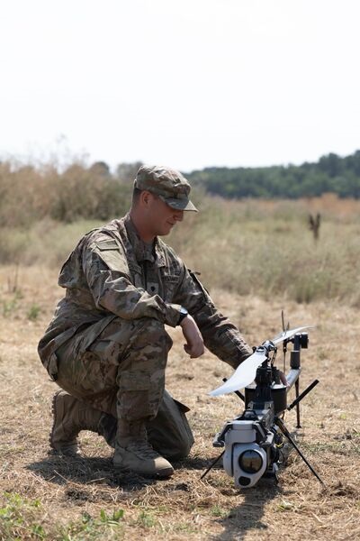 A 101st Airborne Division soldier prepares an Anduril Ghost-X UAS during an exercise in Romania during July 2025. Although the 101st is a TiC unit, regular army units will soon be able to select UASs from the marketplace.