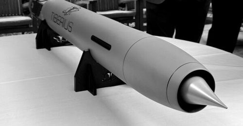 A model of Tiberius Aerospace's Sceptre ramjet 155 mm munition displayed in May 2025.