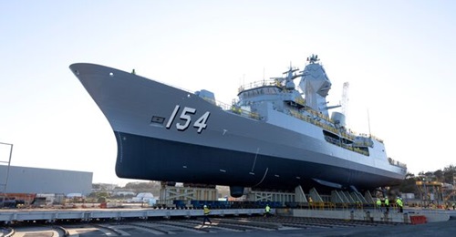 The RAN's Anzac-class frigate HMAS 
        
         being undocked in May after undergoing an upgrade.