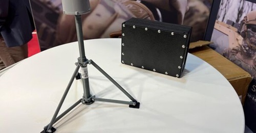 A scale model of MyDefence's Wolfpack (left) and a full-size unit of its Watchdog 250 (right) UAS detectors at DSEI 2025.