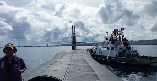 USS 
        
        , shown here, operating off the coast of Guam, apparently will not be inactivated in FY 2026 as previously planned.