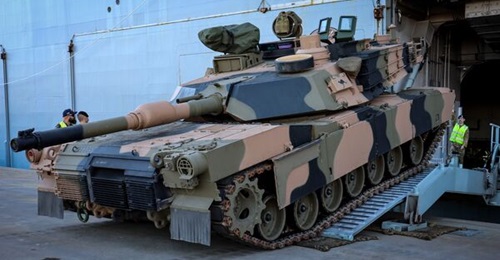 An Australian Army M1A2 SEPv3 Abrams main battle tank, seen here embarking on HMAS 
        
         during sea transportability trials at the Port of Townsville, Queensland, on 4 September 2025.