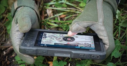 Systematic's SitaWare Edge seen displayed on a tactical communications device.