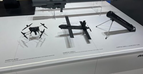 MBDA Italy's Harpax loitering munitions (left and centre), and the Fulgur launcher (right) displayed at the Seafuture expo in La Spezia, Italy, in September 2025.