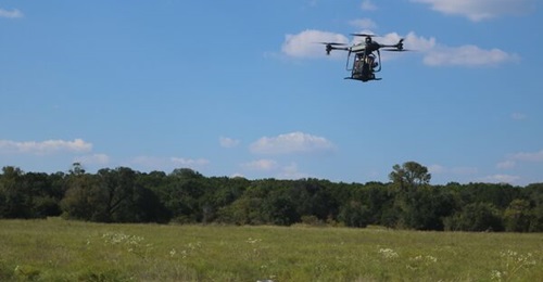 A TRV-150 lifts a smoke obscuration device during a US Army 36th Engineer Brigade combat training exercise in Fort Hood, Texas.