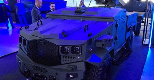 WB Group's Future Task Force multivehicle concept, with three wheeled platforms in a row, displayed at MSPO 2025.