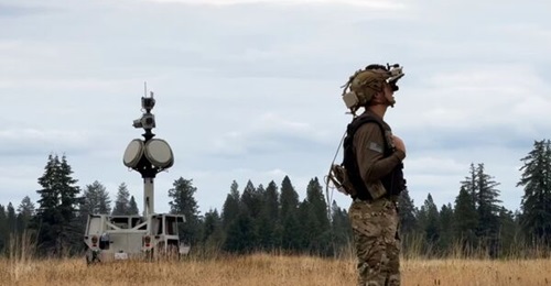 US Army soldier evaluates an IVAS platform integrated with Anduril Industries' Lattice mesh network software.
