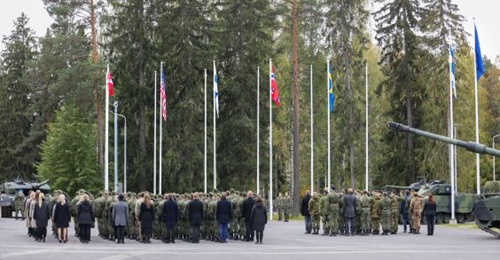 The MCLCC-NW was inaugurated in Mikkeli, Finland, on 3 October, with the raising of the flags of countries providing the core staff element (left to right: Denmark, US, Finland, Norway, and Sweden), together with the NATO flag (far right).