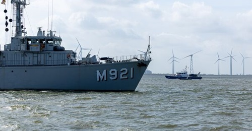 The Belgian Navy minehunter BNS 
        
        patrols off a CUI site in the North Sea during Exercise 'Sandy Coast 2025', alongside maritime agency vessels.