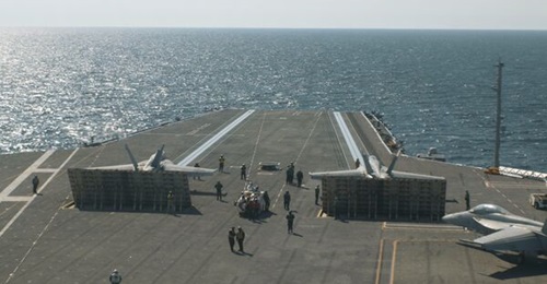 USS 
        
        , shown here conducting flight operations in the Atlantic Ocean, is being deployed into the Caribbean.