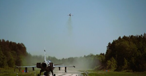 A pair of SwAF Gripen combat aircraft depart during an air-defence exercise. The head of the service has stressed the need to enhance its capabilities at speed if deterrence over Russia is to be maintained.