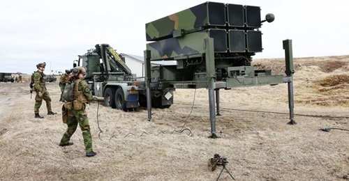 Soldiers from Norway's Air Defence Battalion set up a NASAMS launcher on Andøya island during Exercise 'Formidable Shield' in May 2025.