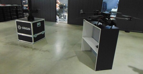 Origin plans to begin mass production of thousands of Blaze UAV interceptors (left) per year starting in December and hopes to increase deliveries of Beak strike UAVs (right).