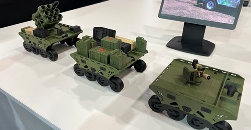Models of the Packmule UGV in various configurations on display at Indo Pacific 2025.