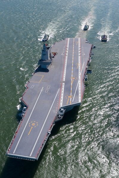 China's third aircraft carrier, 
        
        , seen at its maiden sea trials in May 2024.