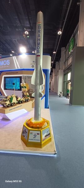A BrahMos missile model is displayed at International Defence Exhibition & Conference (IDEX) 2025.