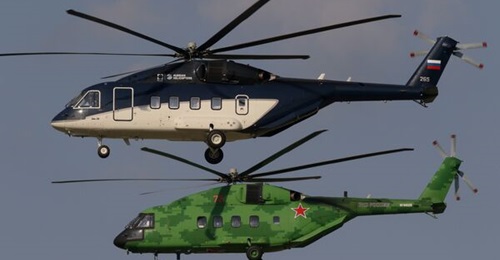Two variants of the Mil Mi-38 helicopters (VIP variant in the foreground and military transport version in the background) conduct a flight over Moscow in 2019. Myanmar's new Mi-38T assault transport helicopters have a single-tone green colour scheme.