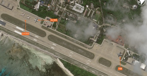 Planet imagery shows PLA Air Force (PLAAF) H-6 bombers and a Y-20 transport at Woody Island in the South China Sea. A PLAAF or PLA Naval Air Force (PLANAF) KJ-500 is also present.
