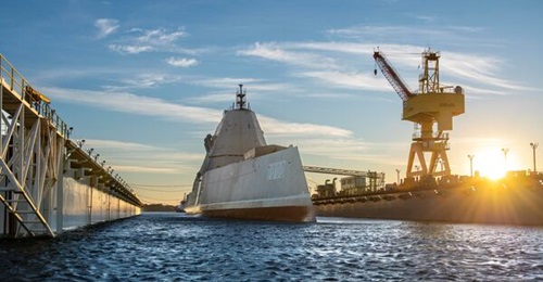 USS 
        
        is shown here undocking after being fitted for hypersonic missile systems.