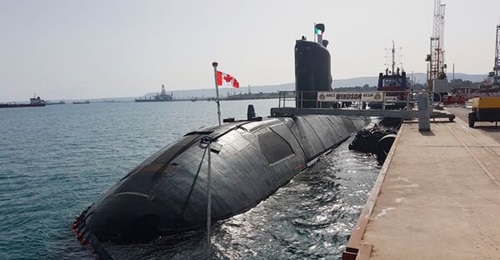 HMCS 
        
        , shown here, is set to become the first Victoria-class submarine to receive a new sonar array.
